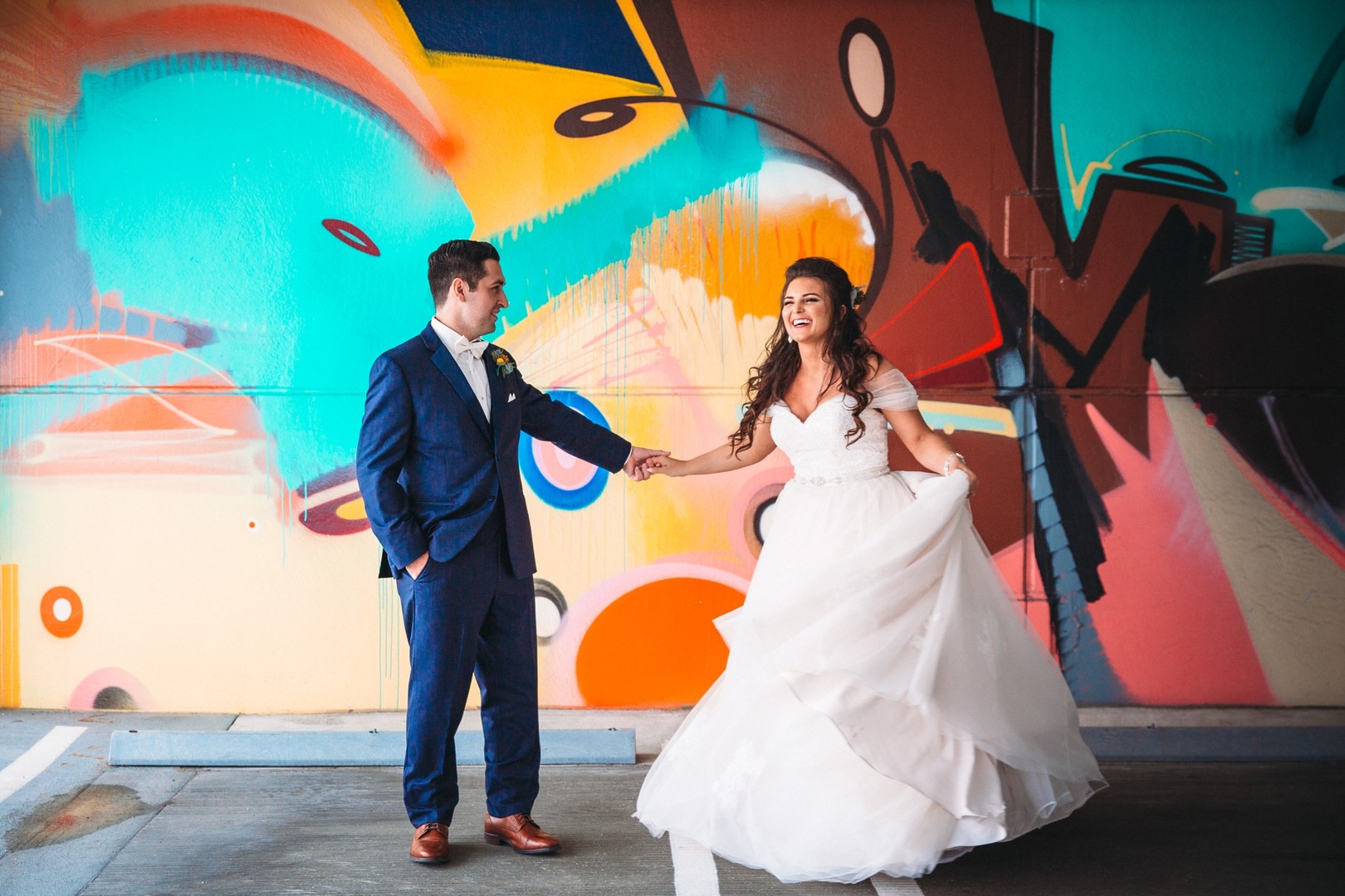 The Mirage Elegant Banquets & Catering Township, MI, Colorful Wedding, Wedding photos at graffiti wall